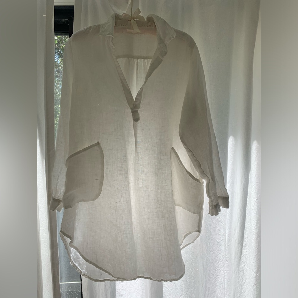 Beautiful white linen tunic. Never worn. Perfect for the summer!